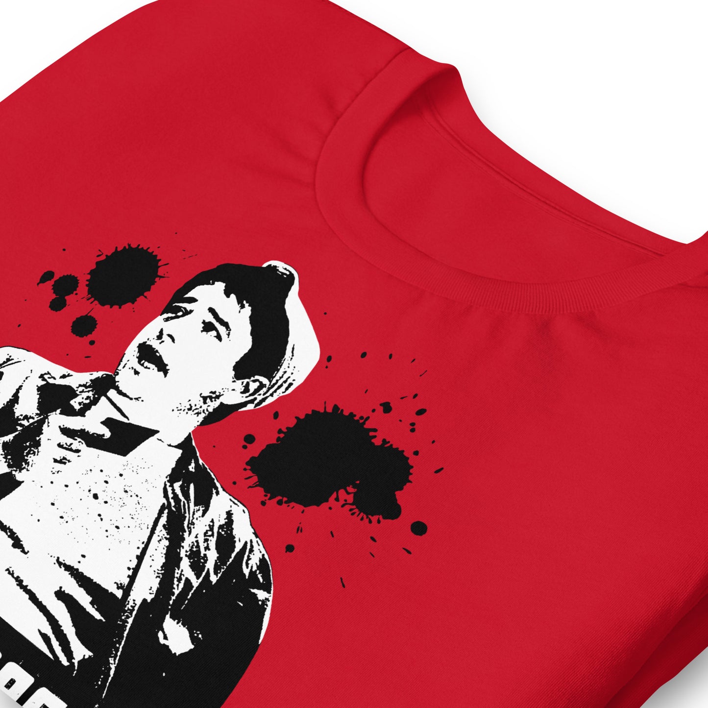 detalle de camiseta joder macho benito manos a la obra manolo en color rojo