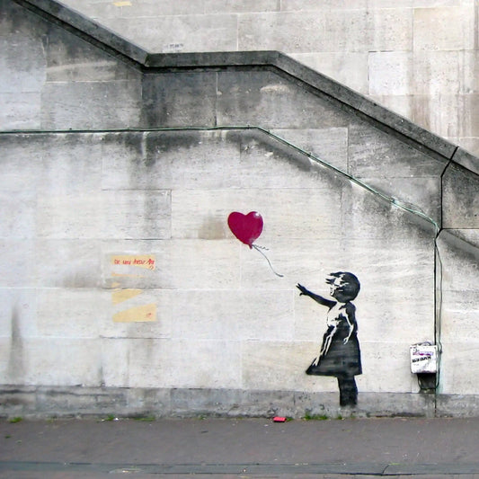 Obra Girl with balloon de Banksy pintada en Londres en 2002