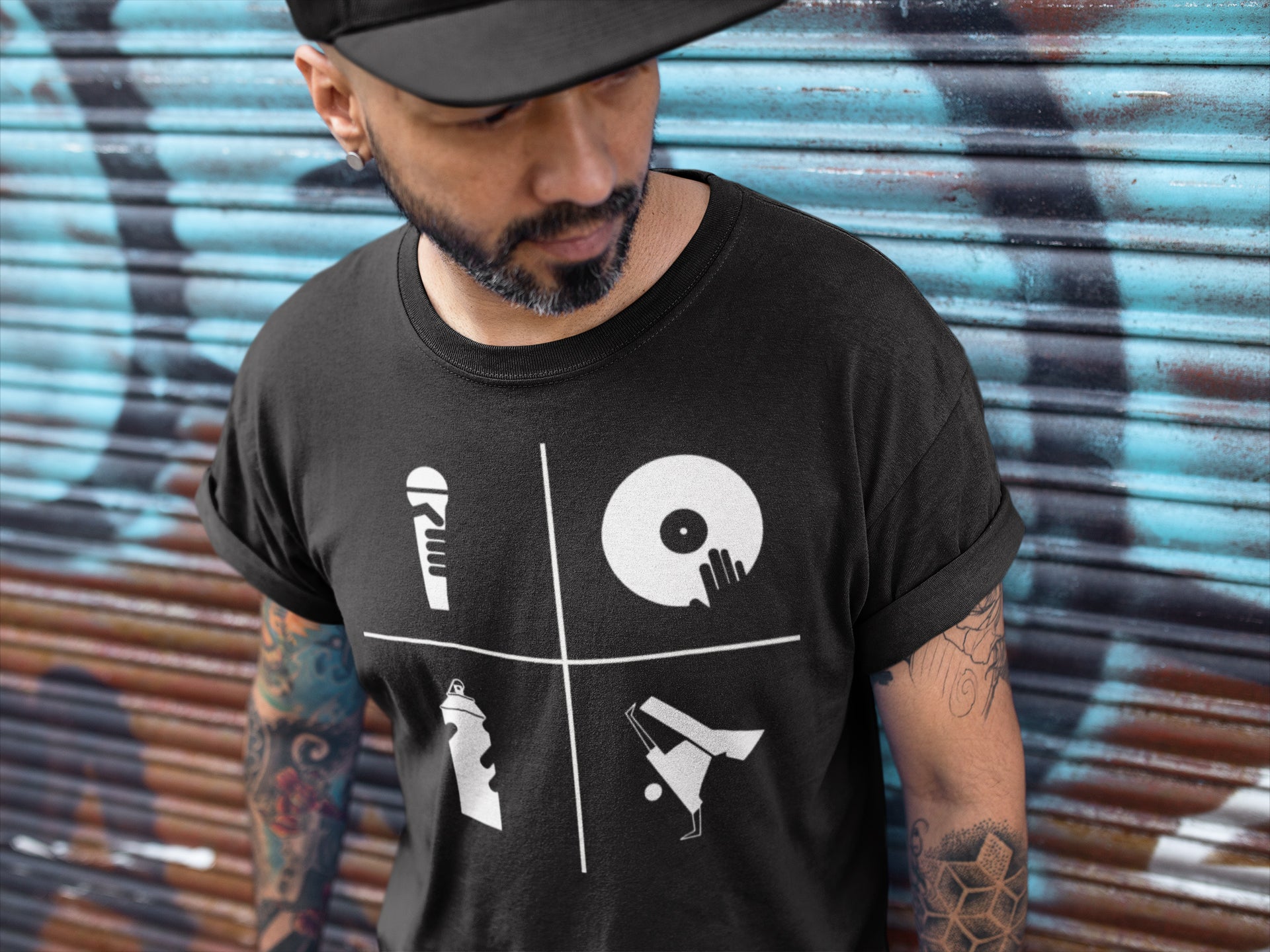 Man wearing 4 elements of hip hop t-shirt