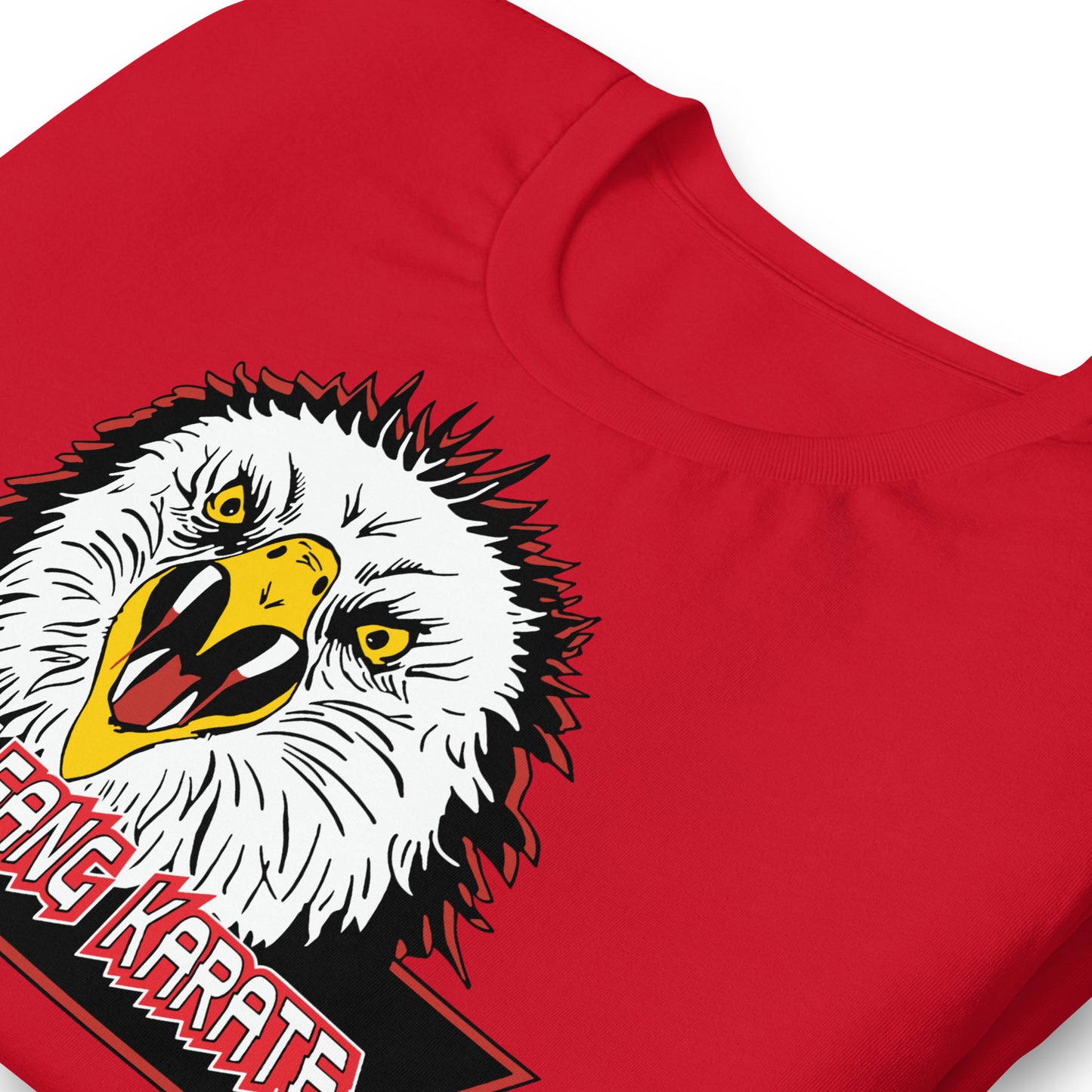 detalle de camiseta colmillo de aguila eagle fang karate roja