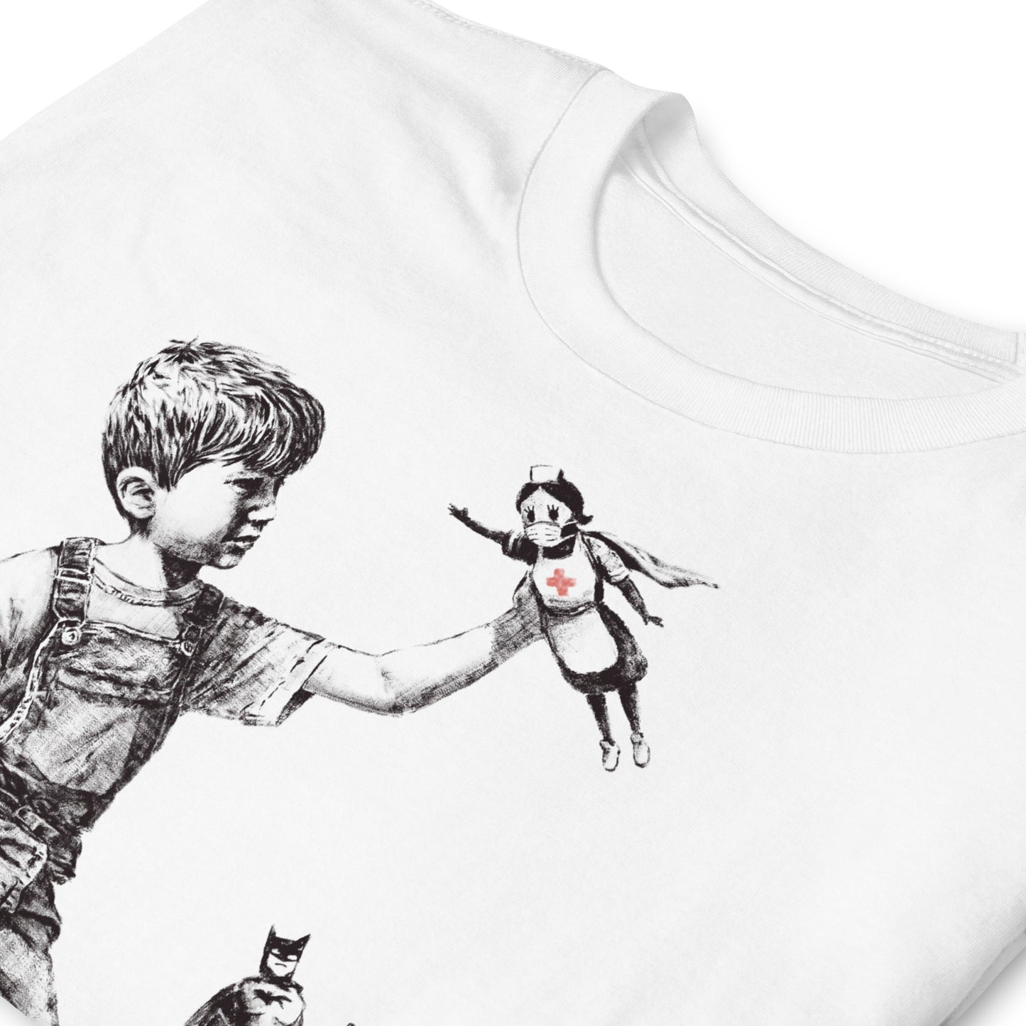 detalle de camiseta game changer banksy blanca