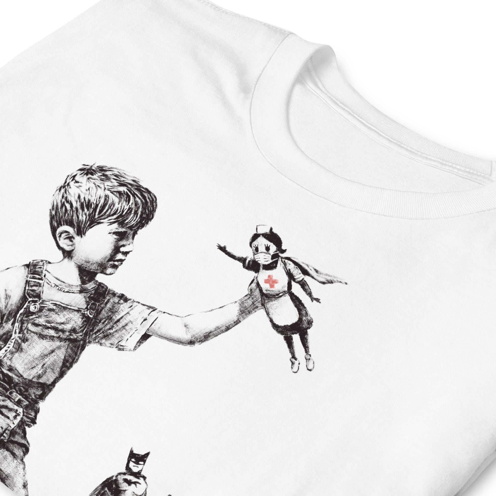 detalle de camiseta game changer banksy blanca