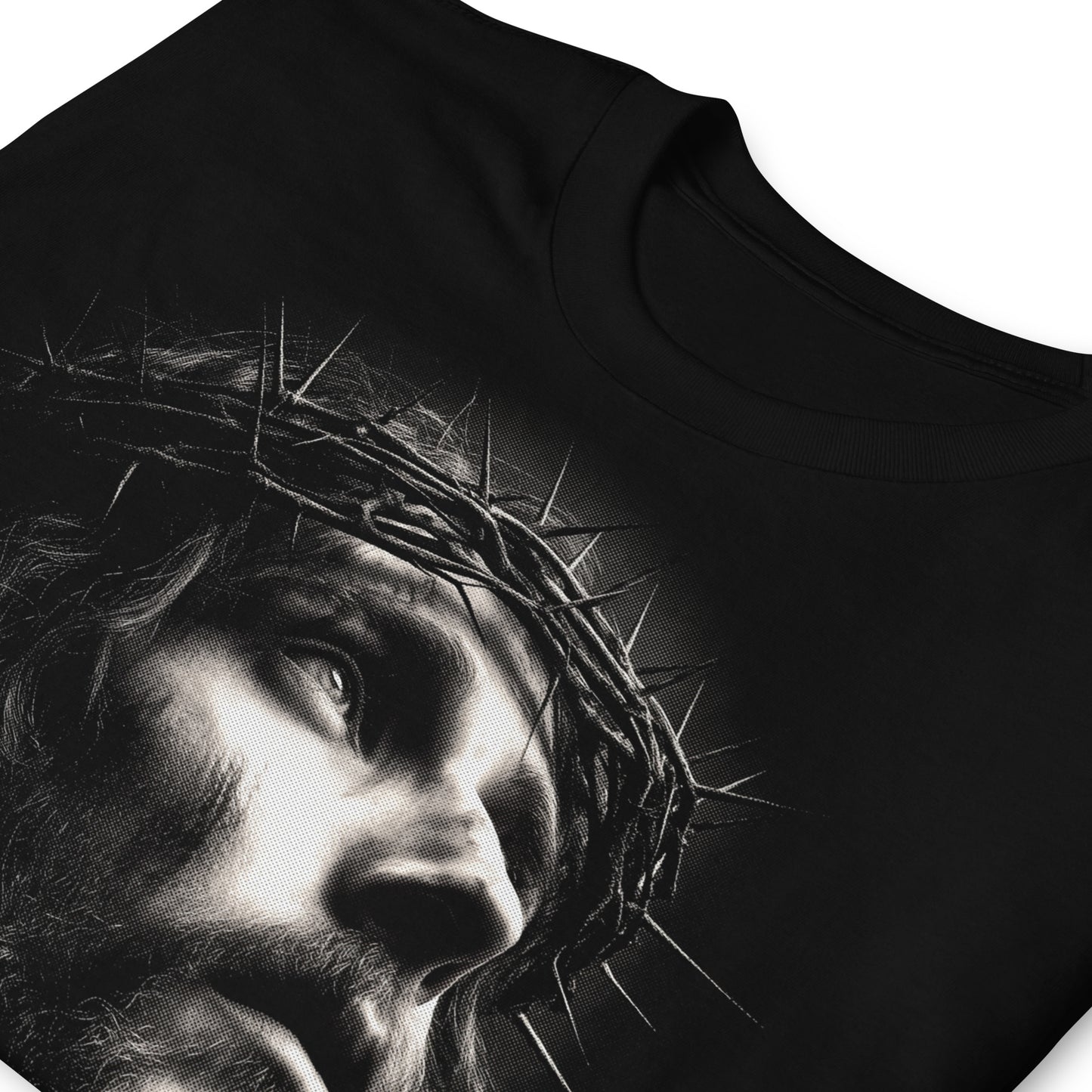detalle de camiseta jesus corona de silencio en color negro
